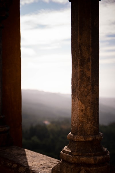 Brown concrete column during the day
